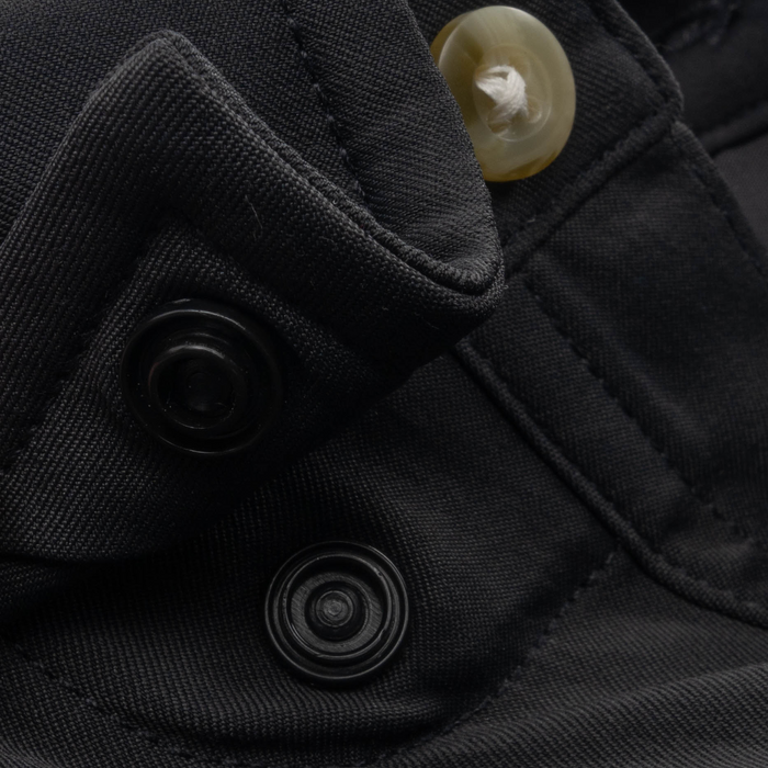 Closeup of collar snaps on collar of shirt