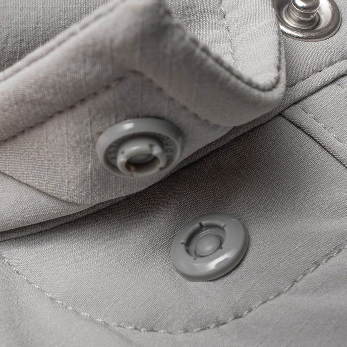 Closeup of collar snaps on collar of shirt
