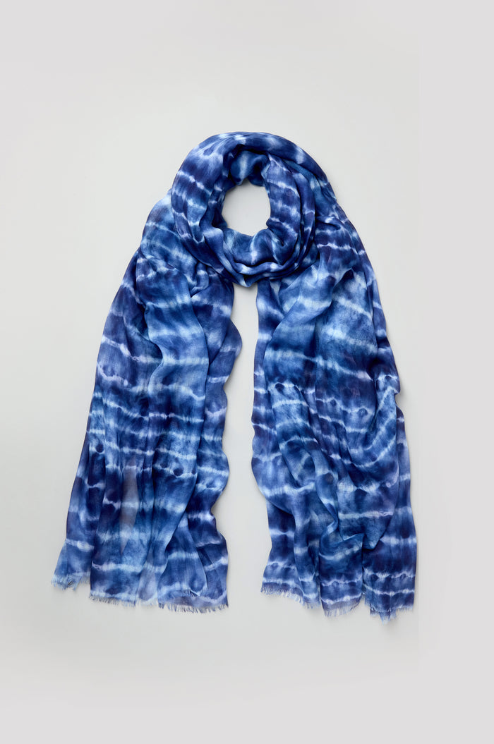 Tie Dye Print Scarf in blue and white modal silk with fringed edges, displayed flat on a plain light background.